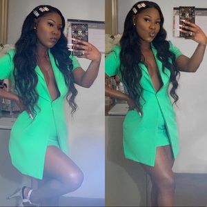 Blazer/skirt connected.